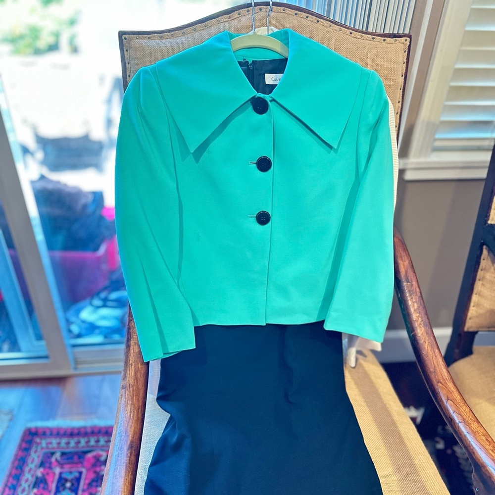 Stylish Teal Jacket with Black Dress
